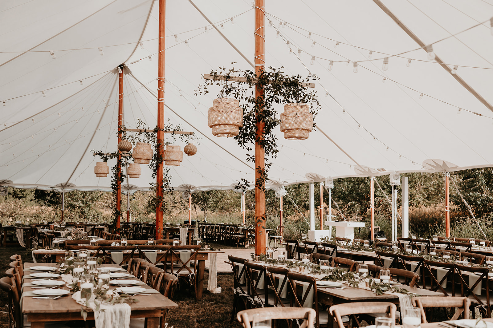The tented reception setting at Betsy and Zach’s private-property wedding