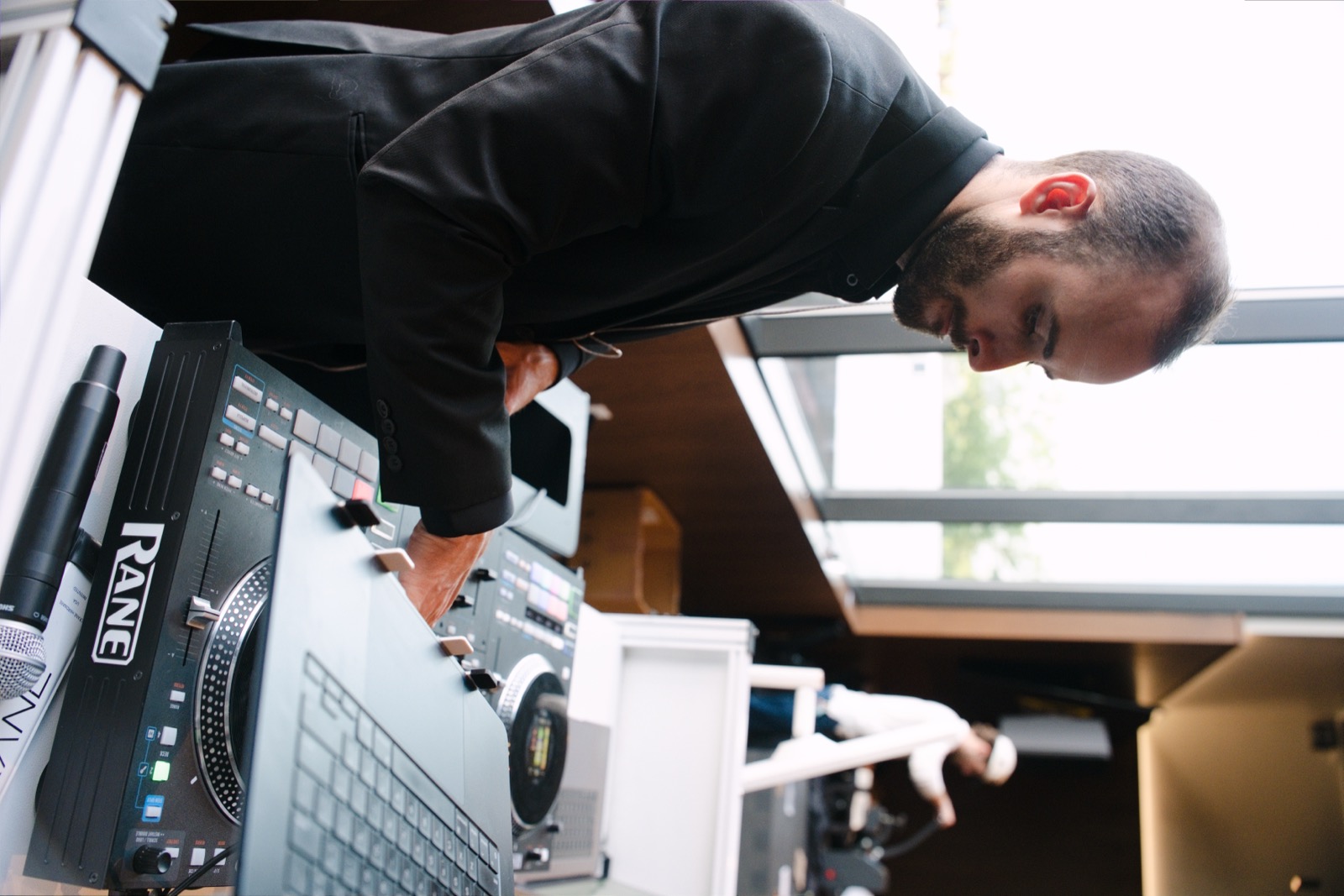 An event performer working at the decks at Scotts Miracle-Gro Field